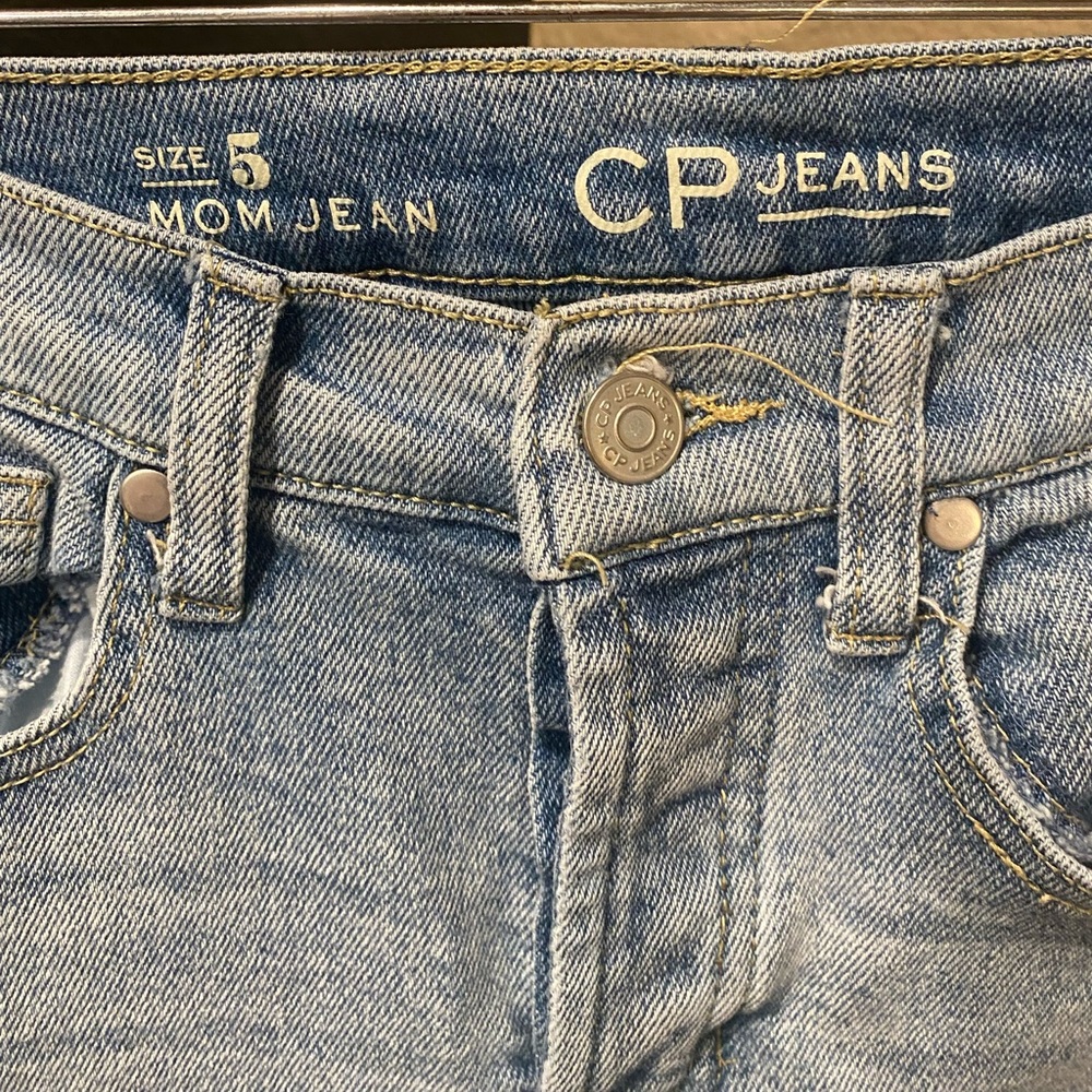 CP button fly mom jeans